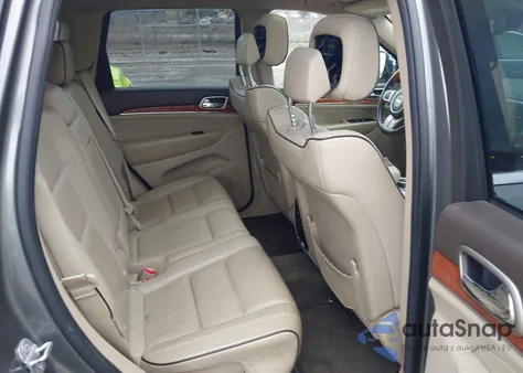 2012 Jeep Grand Cherokee Overland z USA, uszkodzony, nr VIN 1C4RJFCTXCC212064